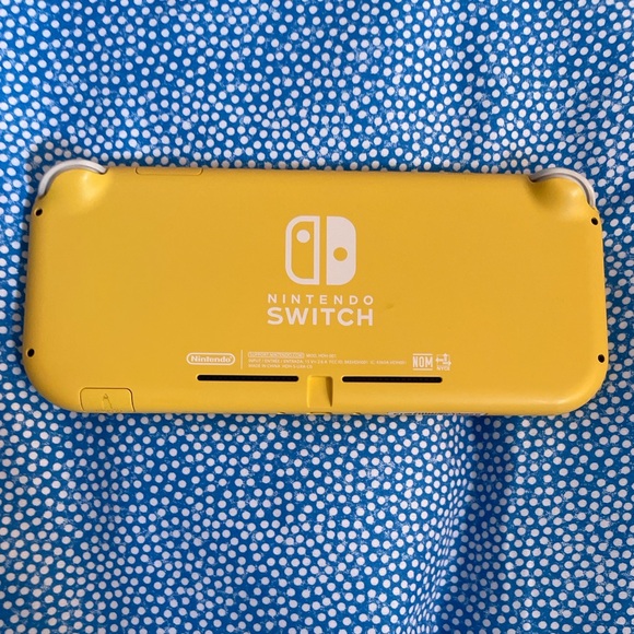 Selling Nintendo switch Lite New with Charger box and two games - Picture 3 of 5